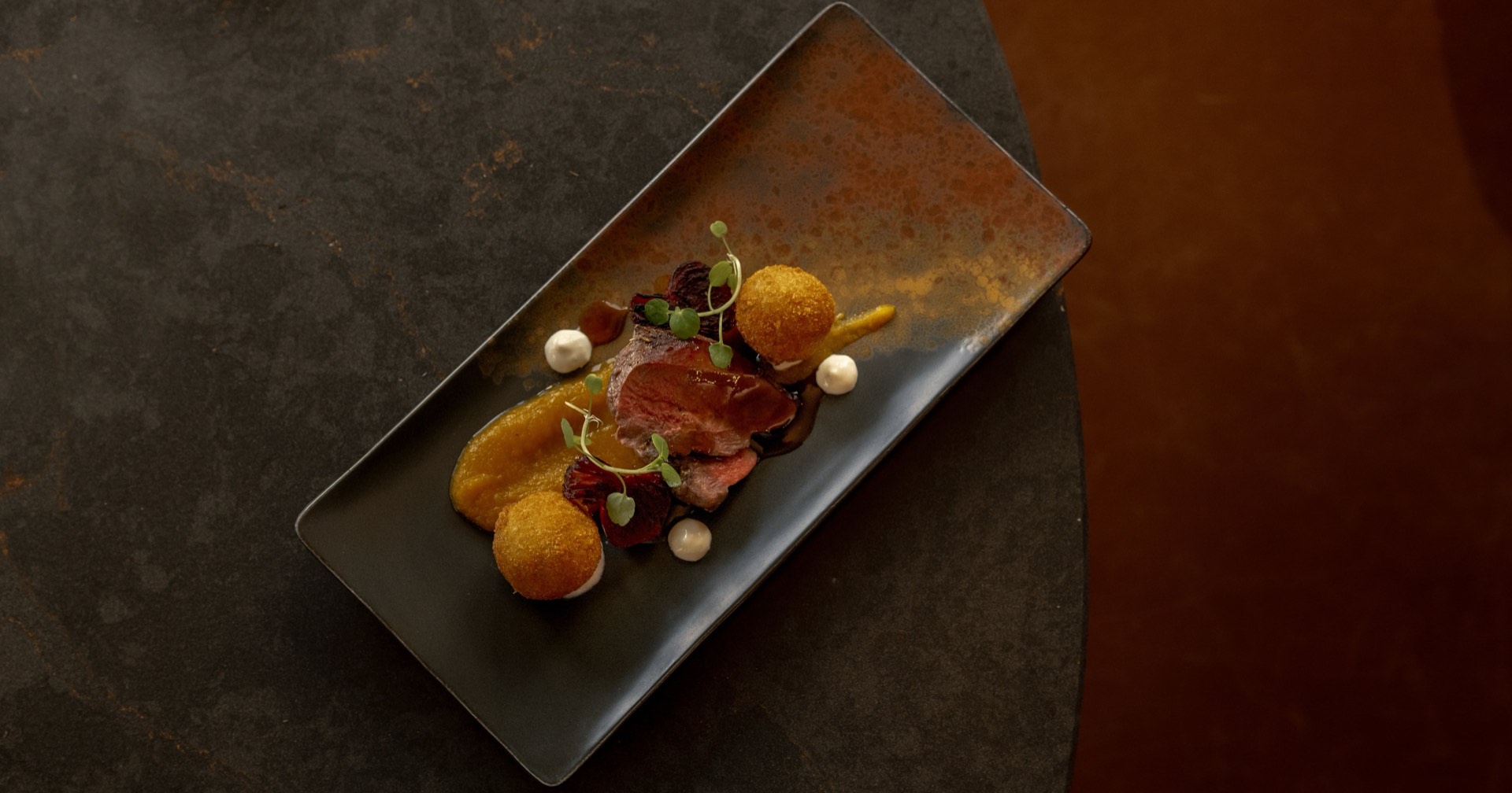 A plated main course served at Mason's