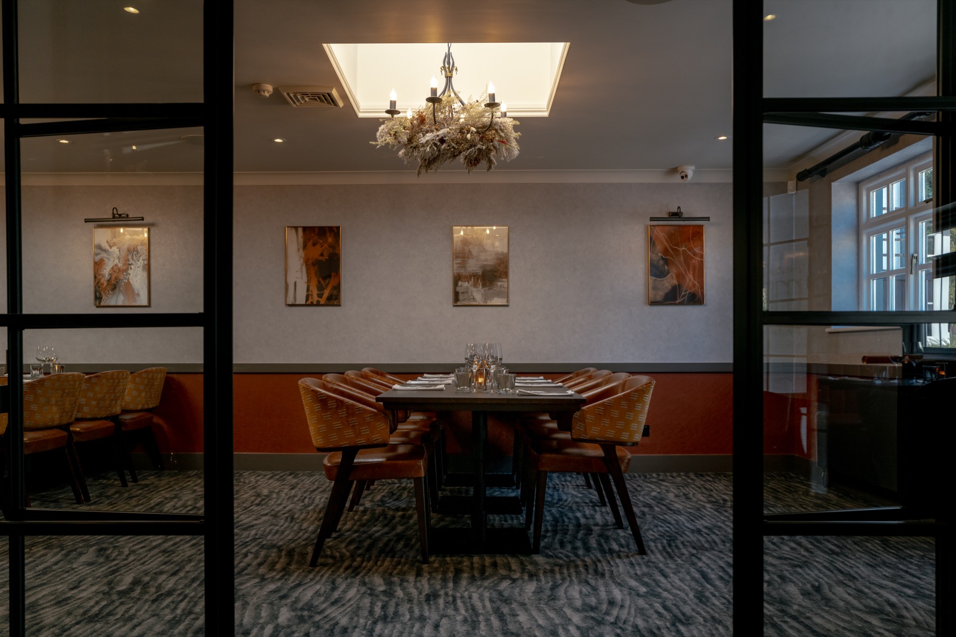 The private dining room at Mason's seen through its glass doors